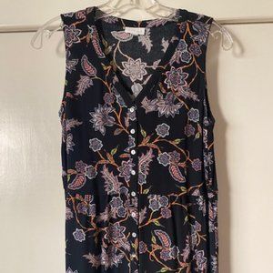 sleeveless top XS: orange, blue-purple, white, yellow-green floral print.